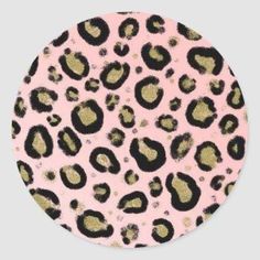 a pink and black leopard print coaster