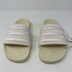 Adidas Originals Women Adilette “Wonder White” Slides Gz3751 New In Box With Tags Uk 7, Us 8. Wonder White / Cloud White / Wonder White. Slip-On. Velvet Bandage Upper. Textile Lining. Synthetic Outsole ** Box And Shoe Are Labeled Women’s Us 8 Uk 7 Bottom Of Sandal Marked In Uk Size 7 ** Adidas White Sandals With Cushioned Footbed, Adidas Sporty White Sandals, Sporty White Adidas Sandals, Sporty Beige Sandals For Summer, Adidas White Sandals For Spring, White Adidas Casual Sandals, Comfortable White Adidas Sandals, Adidas White Flat Sandals, White Adidas Flat Slides