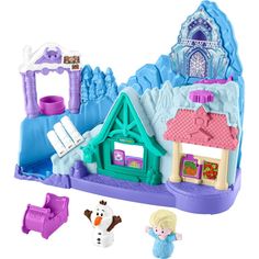 a frozen princess doll house with accessories including a snowman and ice queen figure set