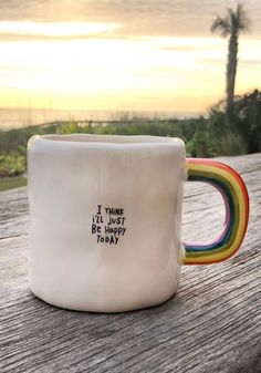 a coffee mug with the words i think it's just be okay today on it