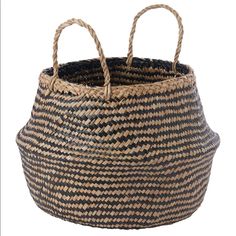 a basket with two handles is shown on a white background and it has black and tan stripes