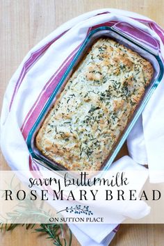 a casserole dish with bread and herbs in it