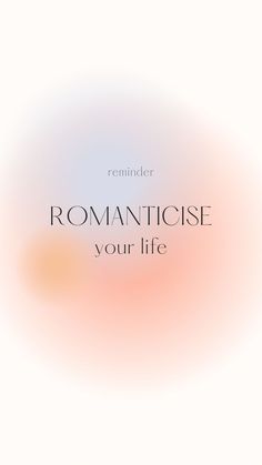 the text reads romanticise your life on a blurry background with an orange and pink hue