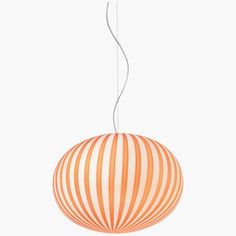 an orange and white striped light hanging from a ceiling