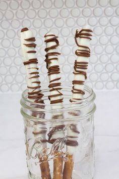 chocolate dipped marshmallows in a mason jar