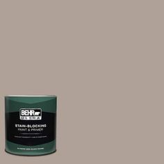 a can of behr paint on a gray background with the words, stain - blocking paint