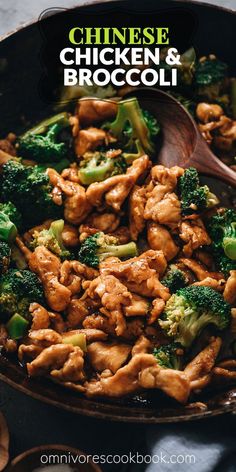 chicken and broccoli in a skillet with a wooden spoon