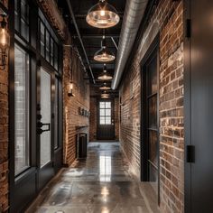 Industrial Chic Hallway Design Polished Concrete Floor, Unique Pendant Lights, Global Textiles, Exposed Brick Walls, Brick Walls