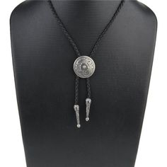 The Western Necklace Is Made Of Antique Silver Plated Alloy, Nickel Free, No Cadmium, Lead, And The Black String Is Made Of High Quality Genuine Leather, Fit For Men Or Women, A Special Apparel Accessory In Your Shirt. The Bolo Tie, One Such Classic Icon, Is Reflective Of Our American Spirit And Ingenuity; It’s Simple, Robust, And Does The Trick. There’s Nothing Fancy About The Cowboy Tie Leather Cord Itself, Though They Can Certainly Dress Up. Practical, Tough, And Elegant, The Western Bolo Tie Cowboy Tie, Western Bolo Tie, Western Necklace, Classic Icon, White Umbrella, Western Necklaces, Gold Tie, Gold Baroque, Versace Gold