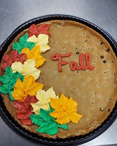 a cake with the word fall written on it