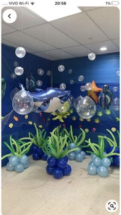 an underwater scene with fish, bubbles and seaweed in the foreground is seen on instagram