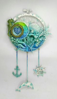 a decorative wind chime with an ocean theme