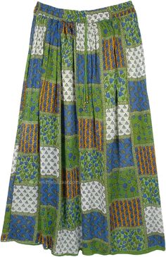 A straight fit, free-flowing, half-lined and slightly crinkled rayon long skirt in green, blue, white and orange colors which reflects a bohemian hippie vibe.  The interesting thing about this skirt is that it looks like a patchwork skirt at first sight, but it's actually not. #tlb #Floral #Printed #Paisley #printedrayonlongskirt #simplelongskirt #greenlongskirt Green Bohemian Long Skirt, Hippie Green Maxi Skirt For Vacation, Bohemian Green Maxi Skirt For Vacation, Spring Festival Green Maxi Skirt, Green Bohemian Maxi Skirt With Boho Print, Hippie Green Skirt For Festival, Green Hippie Maxi Skirt For Festival, Green Bohemian Maxi Skirt For Festival, Green Cotton Maxi Skirt For Festival