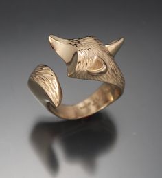 the fox ring has been my most popular ring so i made this one adjustable and engraved deeper fur . cast in a low tarnish bronze it will look like gold for a long time see other listing for eyes Bigfoot Drawing, Bronze Accessories, Fox Ring, Gold Fox, Wolf Ring, Fox Jewelry, Animal Ring, Wolf Necklace, Unusual Jewelry