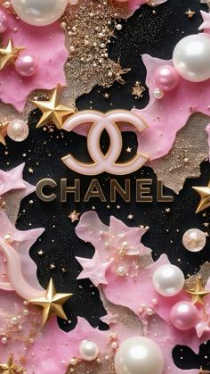 the chanel logo is surrounded by pink and gold stars, pearls, and glitters