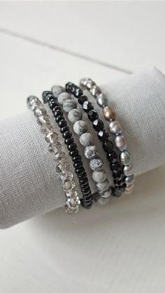 Grey pearls stones layered beaded cuff bracelet Adjustable Gray Bracelets With Faceted Beads, Gray Adjustable Bracelets With Faceted Beads, Adjustable Gray Bracelet With Faceted Beads, Elegant Gray Bracelets With Gemstone Beads, Elegant Gray Gemstone Beads Bracelets, Gray Beaded Multi-strand Jewelry, Gray Hand-strung Bracelets With Round Beads, Gray Faceted Beaded Bracelets As Gift, Gray Faceted Beaded Bracelets For Gifts