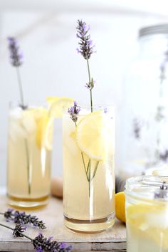 two glasses filled with lemonade and lavender sprigs