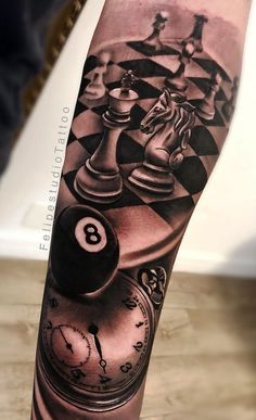 a man's arm with a clock and chess pieces on it, as well as the number eight