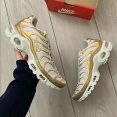 New Womens Nike Air Max Plus Size 6 Metallic Gold And Vast Grey. Brand New In Box (No Box Lid). Womens Nike Air Max, Iconic Models, Nike Gold, Nike Air Max For Women, Womens Nike, Nike Air Max Plus, Air Max Plus, Saucony Sneaker, Metallic Gold