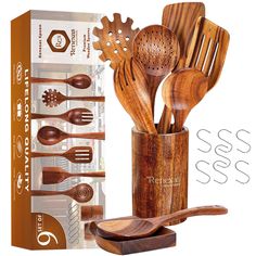 wooden utensils and spoons are in a cup