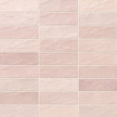 a white and pink tiled wall with no one in it's place on the floor