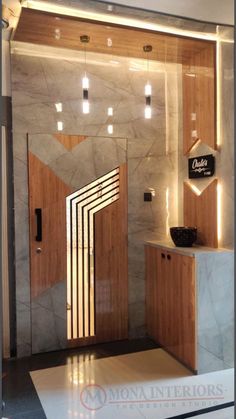 the interior of a modern bathroom with marble walls and floors