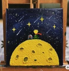 a painting of a man sitting on top of a yellow moon with stars in the sky