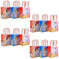 small disney princess bags with handles and handles are lined up against the white background, each bag has an image of snow queen on it's face