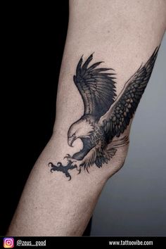 an eagle tattoo on the arm