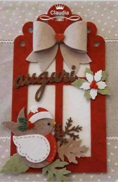 a red frame with a bird and some leaves on the bottom that says august in spanish