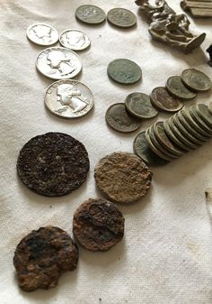 some coins and other items on a table