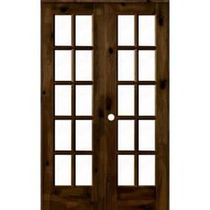 a wooden door with two glass panels