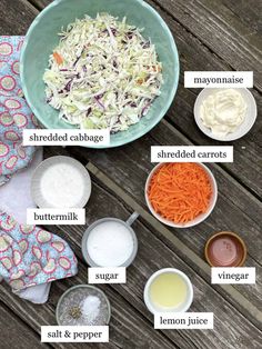 the ingredients to make coleslaw are shown in bowls on a wooden table, including carrots, mayonnaise, shredded cabbage, shredded carrots and butter