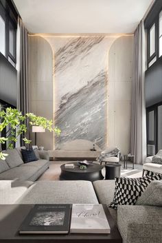 a modern living room with marble walls and flooring