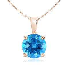 Linked to a single bale is a sparkling Blue Topaz secured in a four prong setting. This solitaire Blue Topaz pendant has a simple design and draws all the attention towards its vibrant sky blue hue. It is crafted in 14k rose gold. Blue Topaz Pendant, Topaz Pendant, Swiss Blue Topaz, Solitaire Pendant, Blue Hues, 18k Rose Gold, Simple Design, Blue Topaz, Prong Setting