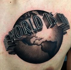 a man's chest with the words world is now on it