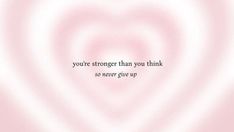 a pink heart shaped background with the words you're stronger than you think so never give up