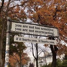 a street sign that says you are not too expensive, you are not overreacing if hurts you, it hurts you