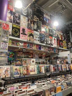 there are many records on the shelves in this store