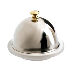 a silver plate with a domed cover on it