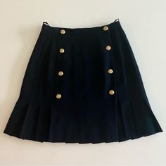 Get Summer Ready With This Iconic Piece Of Chanel History! Beautiful 100% Authentic Chanel Pleated Miniskirt. Size: Us 2 (Please Note: Size Has Been Approximated. Refer To Measurements Below.) A Staple In Every Wardrobe, The Pleated Mini Skirt Can Bring Your Academia Looks From Summer To Winter, Just Add Knee High Boots And Tights. If You're More Of A Coquette Girlie Pair It With A Romantic Voluminous Blouse And Add A Bow In Your Hair. Thinking Of Keeping It Casual? Throw On A Crop Top And Sneakers And Voila! This Skirt Can Truly Do It All. Wrap Around Style. Two (!!!) Rows Of 4 Functional 14k Gold Cc Logo Buttons At The Front. (8 Buttons Total) Vintage - Excellent Preowned Condition. No Chanel History, Academia Looks, Pleated Miniskirt, Get Summer Ready, Chanel Skirt, Chanel Vintage, Fabric Tags, Gold Logo, Cc Logo