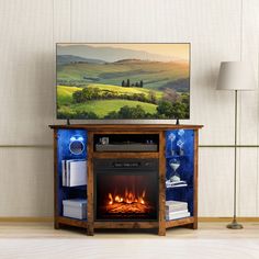 an entertainment center with a fireplace in the middle and a painting on the wall behind it