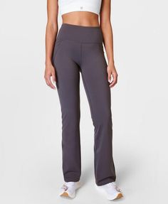 A sleek update on our flared trousers in our bestselling Power fabric. Sweat-wicking and quick-drying with 4-way stretch. Bum-sculpting seams and a flattering new bootcut silhouette. Features an adjustable internal drawcord at the waist. Two side slip pockets and zip pocket at the back of the waistband. Inseam length: 76cm / 30". Model wears size S, 32" inseam and is 178cm/5'10"" tall. Style Code: SB9218SColour: Urban Grey Power Workout, Boot Cut Leggings, Flared Trousers, Running Leggings, Sweaty Betty, Performance Outfit, Active Women, Grey Women, Women's Trousers