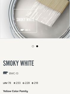 a white paint can with the words smoky white on it, and an image of a brush