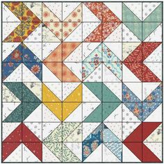 a quilt pattern with many different colors and patterns on it, including one in the center