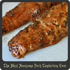 two pieces of meat sitting on top of a cutting board with the words, the most awesome pork ingredient ever