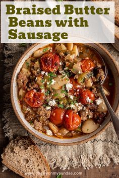 a bowl filled with beans and sausage next to bread on a wooden table, with text overlay