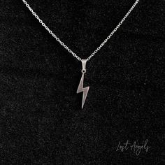 Lightning Bolt Necklace in Silver Also available in Gold and Rose Gold - Please check other listings. Material: Silver Plated Size: Pendant 2.5cm // Chain 46cm  Lobster Clasp Closure Comes with gift pouch Mens Pendant Necklace Unique, Mens Pendant Necklace Silver, Necklaces For Boys, Lightning Bolt Jewelry, Lightning Necklace, Lightning Pendant, Jewels Diy, Lightning Bolt Necklace, Boys Necklace