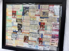 a framed display with many different sports cards on it