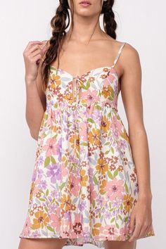 The Andriana Lavender Floral Babydoll Cami Mini Dress will have you looking good all season long! Lavender, white, pink, mustard, and sage floral fabric forms this front tie mini dress with adjustable cami straps and cutout bodice. Attached mini skirt falls from an empire waist. The cutout back finishes the look! Style with slip-on sandals for a casual look! DETAILS & CARE 100% Cotton. 100% Polyester Linning. Machine wash cold. Imported. Babydoll Cami, Cami Mini Dress, Europe Outfits, Casual Preppy Outfits, Lavender Floral, Mini Cami Dress, Fall Skirts, Preppy Outfits, Cami Dress